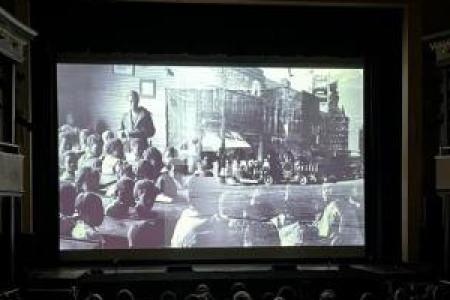 photo of audience watching a screening of the Athens Film Project
