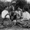 Men and women drinking beer in rural setting, 1915.  Courtesy Culver Pictures, Inc.